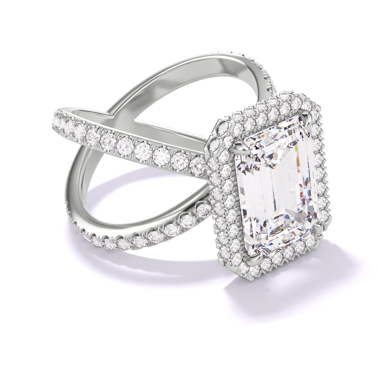 EMERALD CUT DIAMOND ENGAGEMENT RING WITH A WRAPPED HALO AXIS PAVE SETTING IN PLATINUM