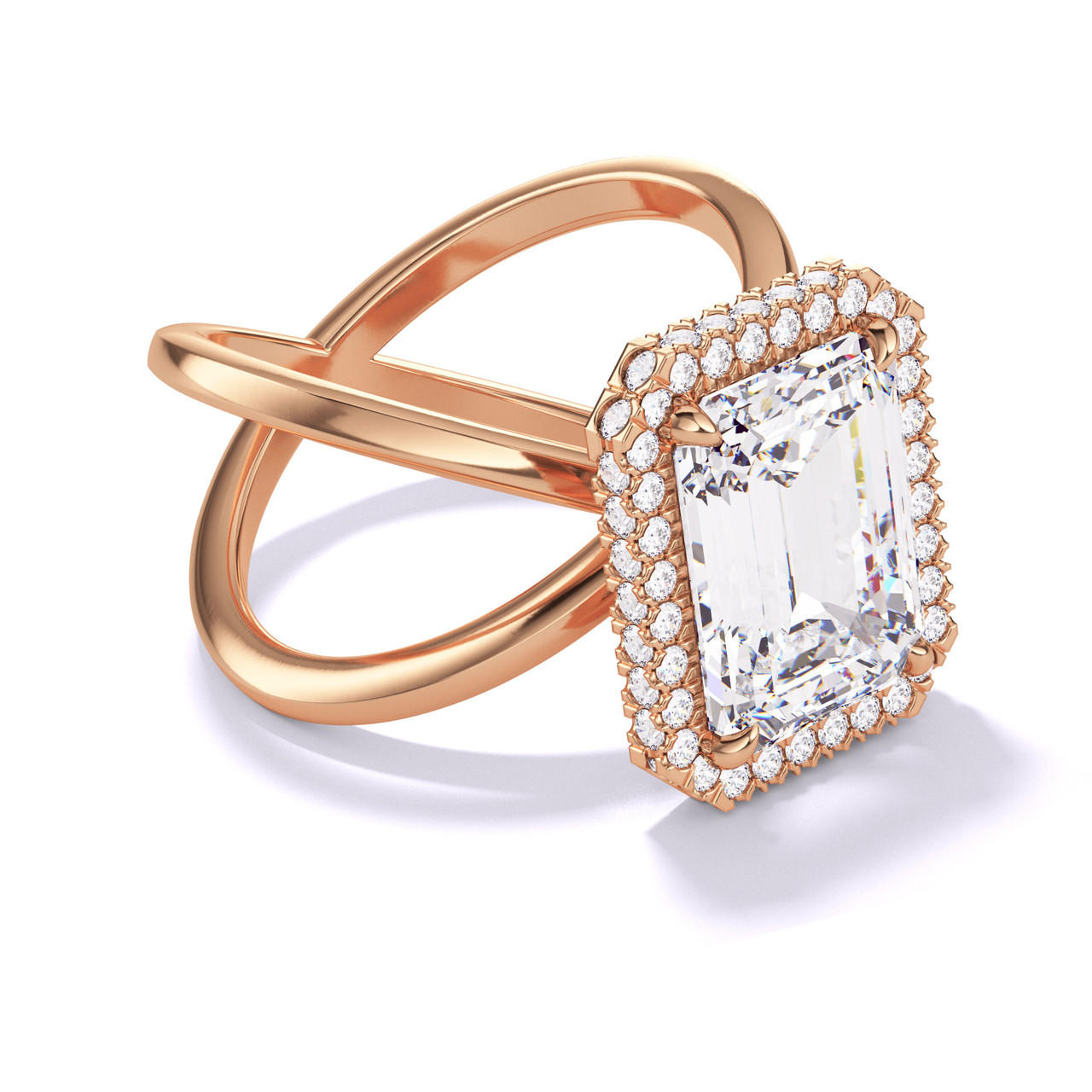 EMERALD CUT DIAMOND ENGAGEMENT RING WITH A WRAPPED HALO AXIS SETTING IN 18K ROSE GOLD