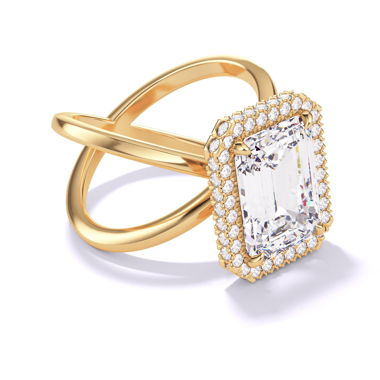 EMERALD CUT DIAMOND ENGAGEMENT RING WITH A WRAPPED HALO AXIS SETTING IN 18K YELLOW GOLD