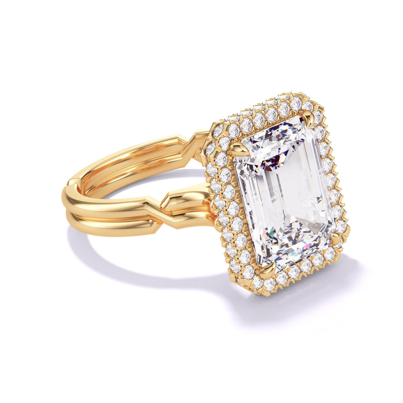 EMERALD CUT DIAMOND ENGAGEMENT RING WITH A WRAPPED HALO CHANCE SETTING IN 18K YELLOW GOLD