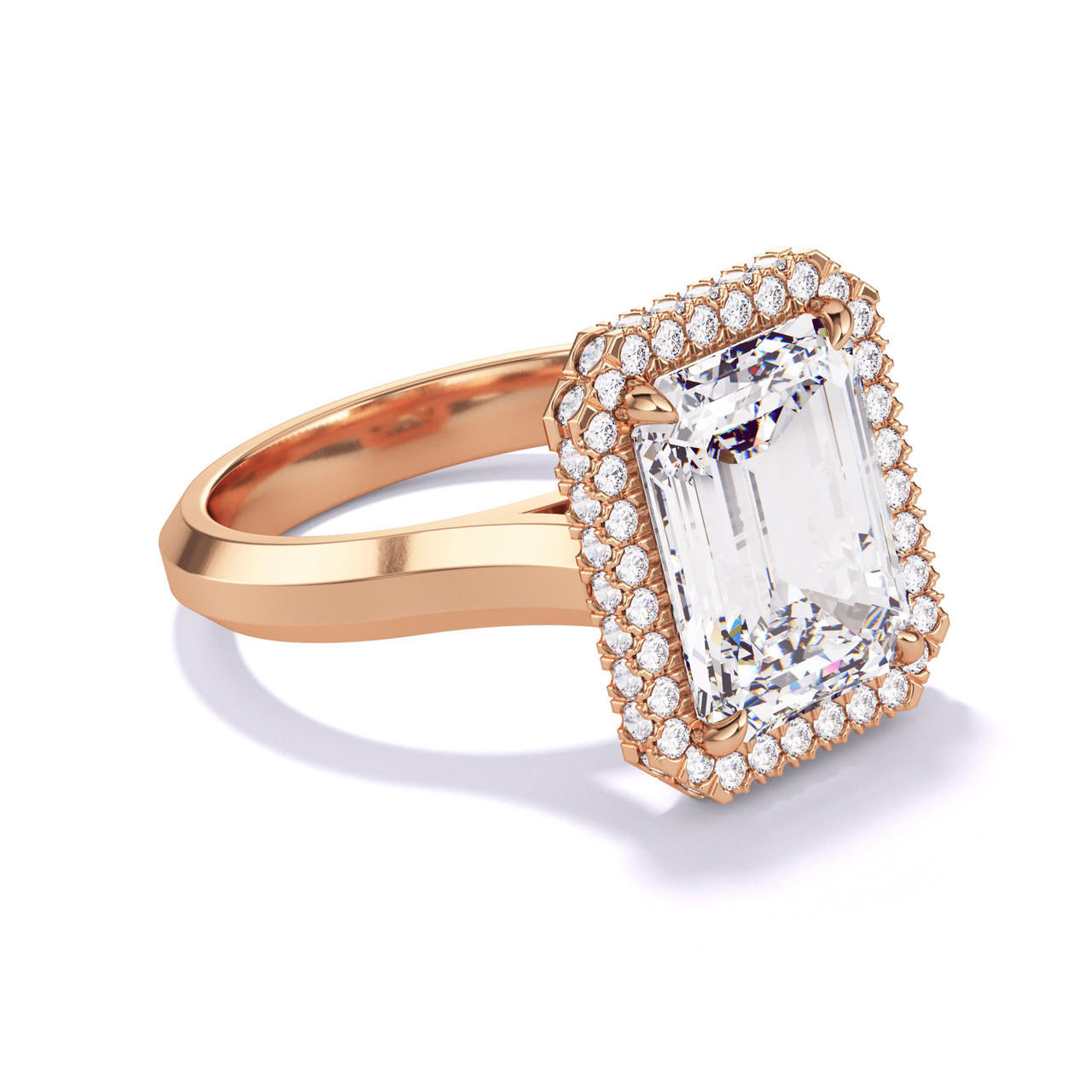 EMERALD CUT DIAMOND ENGAGEMENT RING WITH A WRAPPED HALO THREE PHASES SETTING IN 18K ROSE GOLD