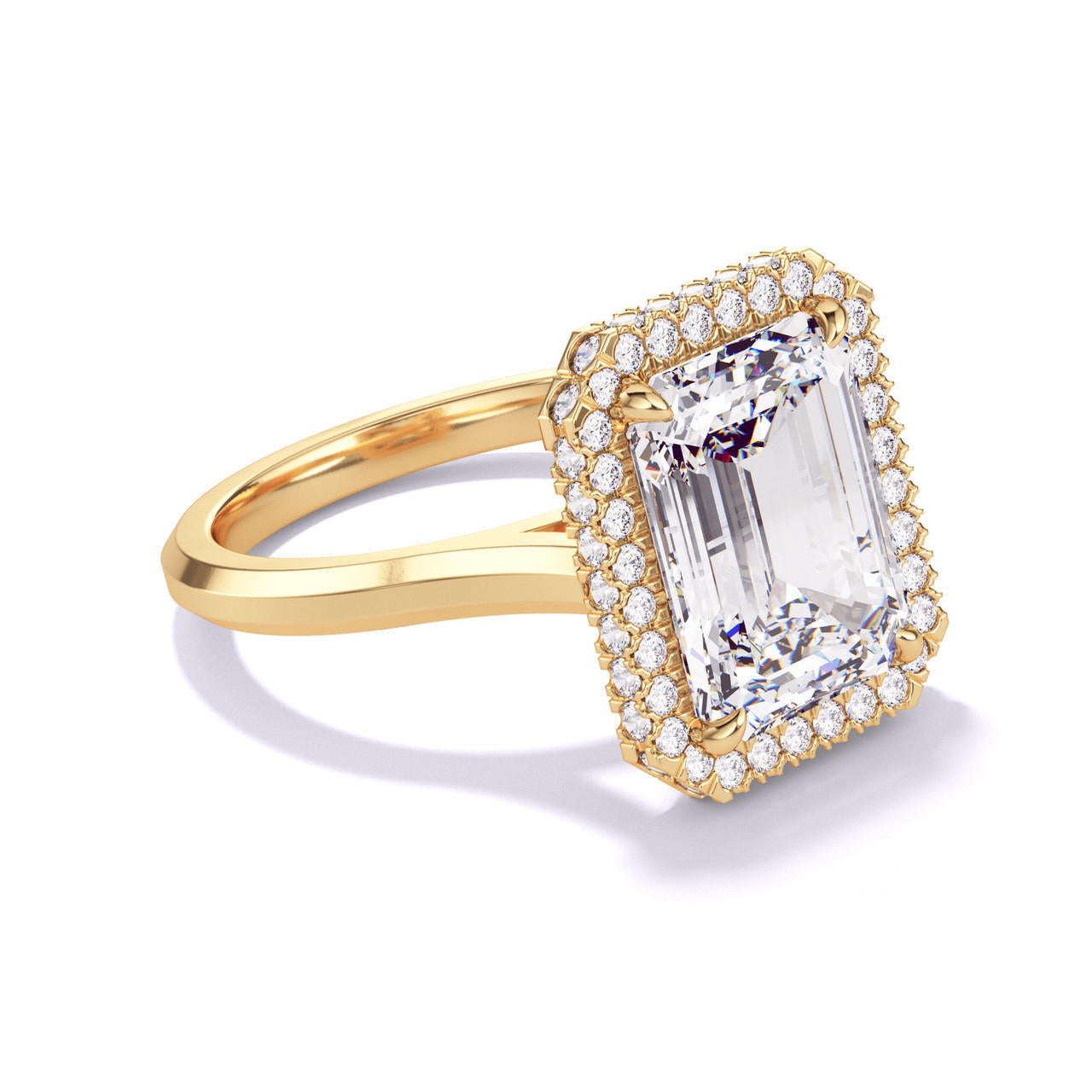 EMERALD CUT DIAMOND ENGAGEMENT RING WITH A WRAPPED HALO THREE PHASES SLIM SETTING IN 18K YELLOW GOLD