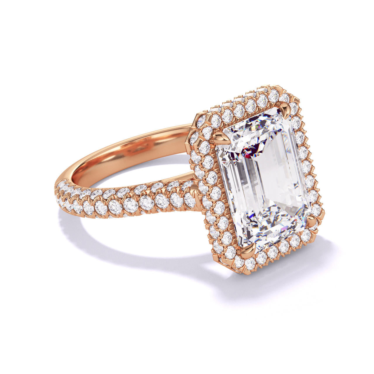 EMERALD CUT DIAMOND ENGAGEMENT RING WITH A WRAPPED HALO THREE PHASES TRIPLE PAVE SETTING IN 18K ROSE GOLD