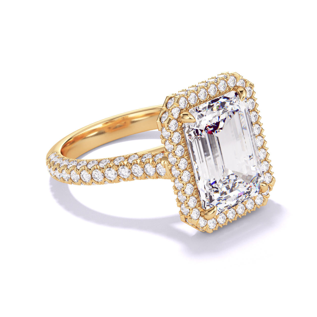 EMERALD CUT DIAMOND ENGAGEMENT RING WITH A WRAPPED HALO THREE PHASES TRIPLE PAVE SETTING IN 18K YELLOW GOLD