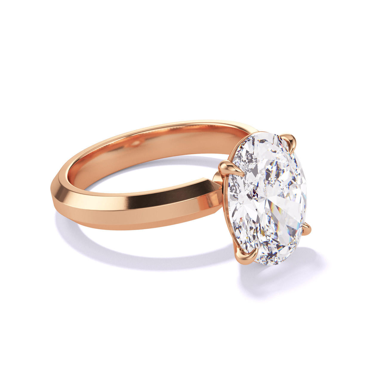 OVAL CUT DIAMOND ENGAGEMENT RING WITH A CLASSIC 4 PRONG THREE PHASES SETTING IN 18K ROSE GOLD