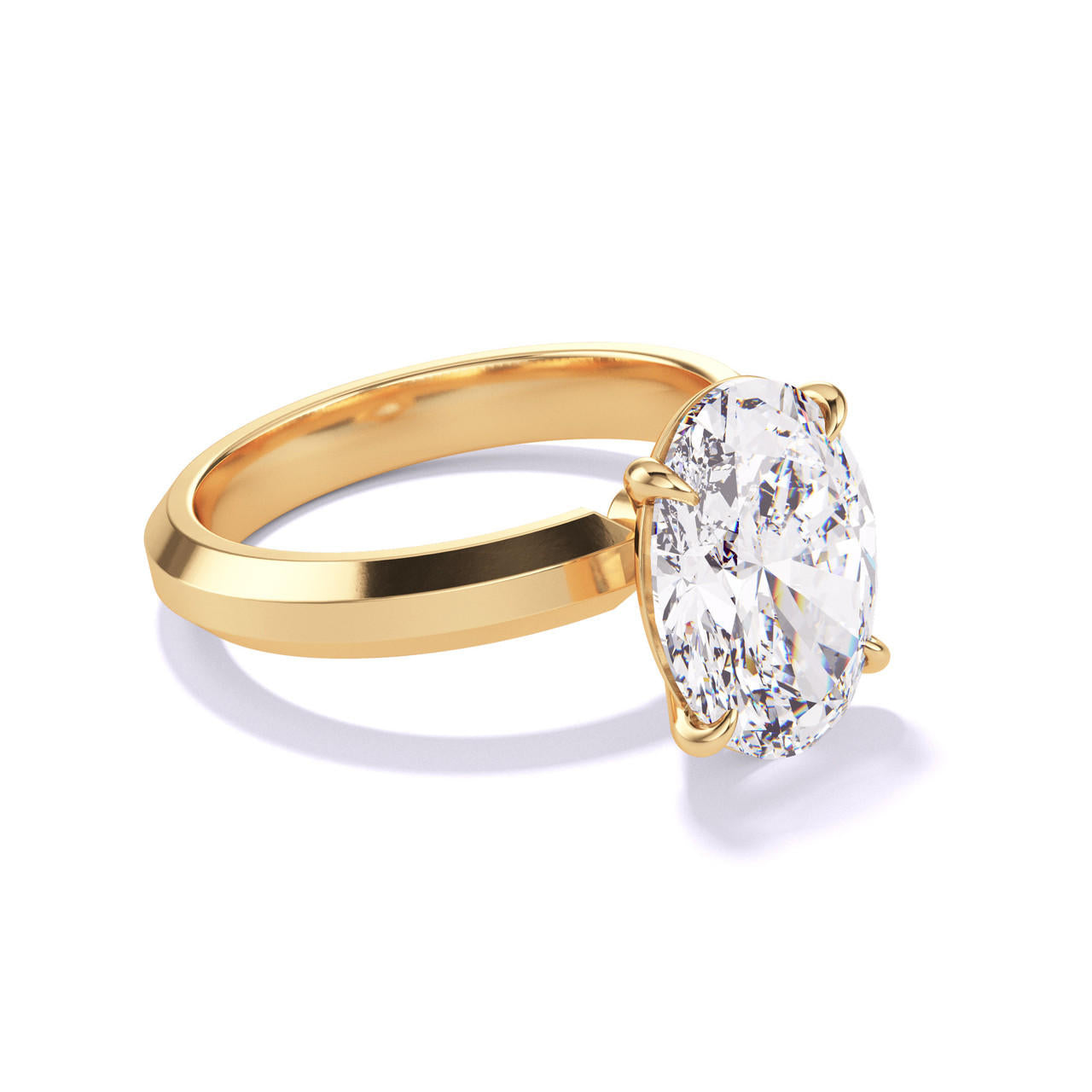 OVAL CUT DIAMOND ENGAGEMENT RING WITH A CLASSIC 4 PRONG THREE PHASES SETTING IN 18K YELLOW GOLD