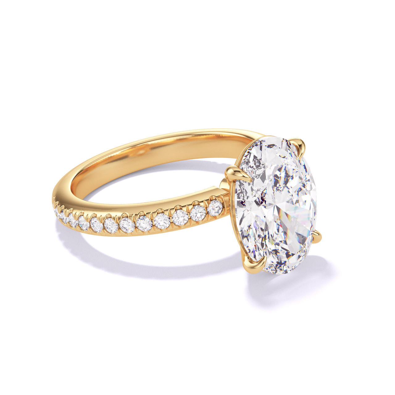OVAL CUT DIAMOND ENGAGEMENT RING WITH A CLASSIC 4 PRONG THREE PHASES PAVE SETTING IN 18K YELLOW GOLD