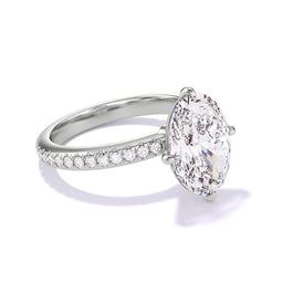 OVAL CUT DIAMOND ENGAGEMENT RING WITH A COMPASS 4 PRONG THREE PHASES PAVE SETTING IN PLATINUM