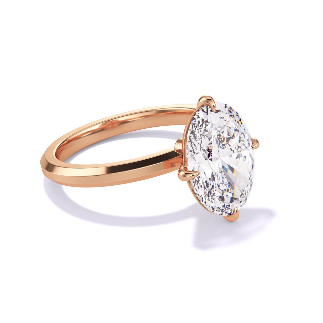 OVAL CUT DIAMOND ENGAGEMENT RING WITH A COMPASS 4 PRONG THREE PHASES SLIM SETTING IN 18K ROSE GOLD