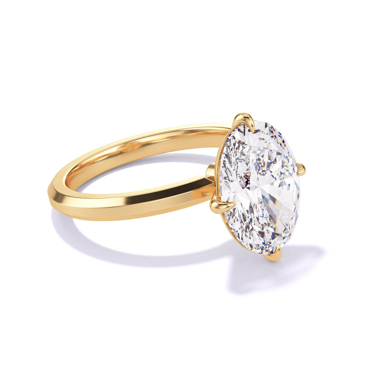 OVAL CUT DIAMOND ENGAGEMENT RING WITH A COMPASS 4 PRONG THREE PHASES SLIM SETTING IN 18K YELLOW GOLD