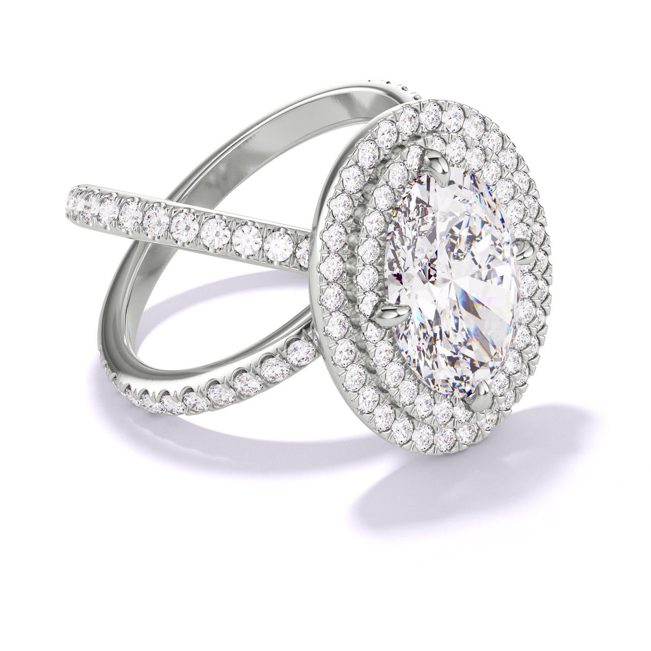 OVAL CUT DIAMOND ENGAGEMENT RING WITH A DOUBLE HALO AXIS PAVE SETTING IN PLATINUM