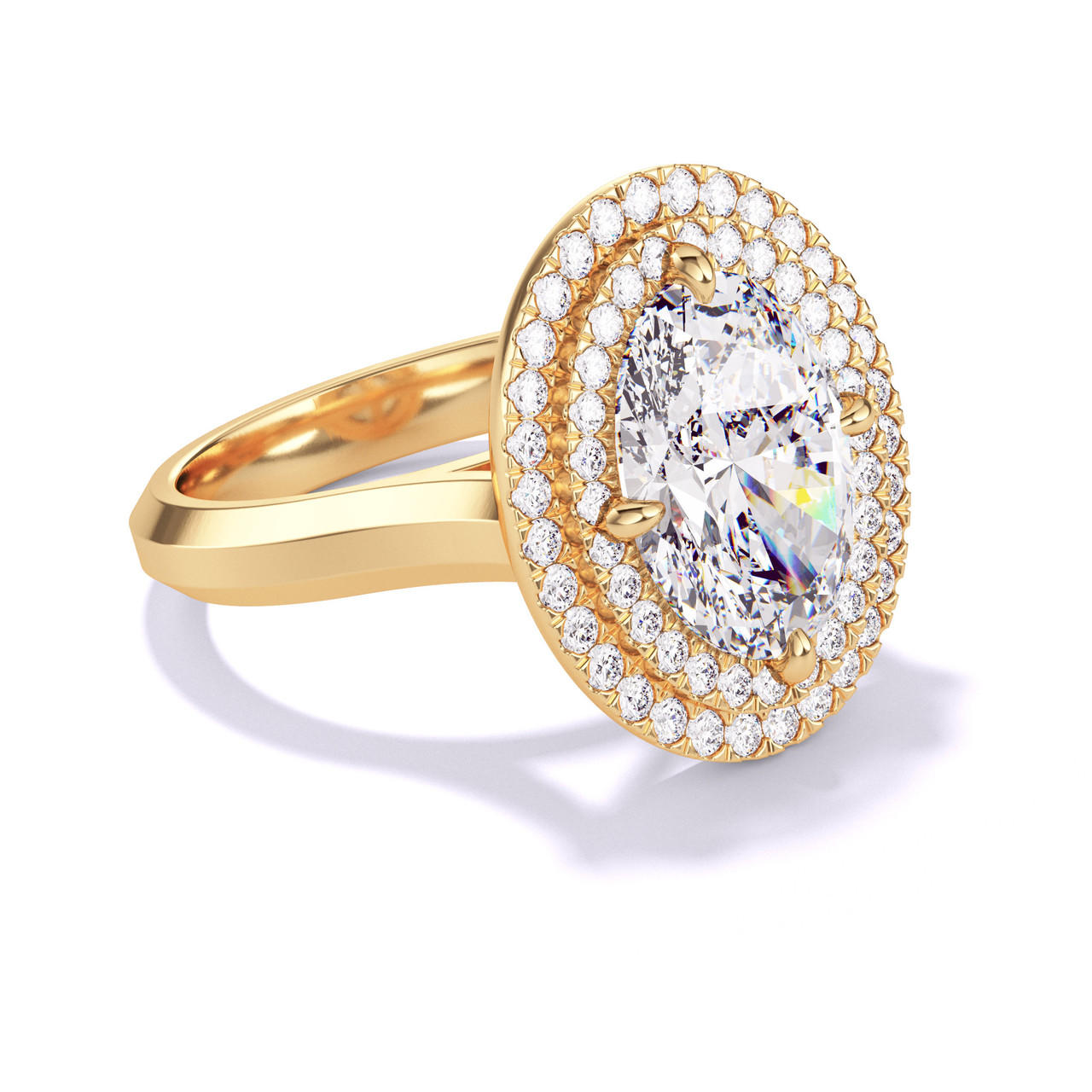 OVAL CUT DIAMOND ENGAGEMENT RING WITH A DOUBLE HALO THREE PHASES SETTING IN 18K YELLOW GOLD