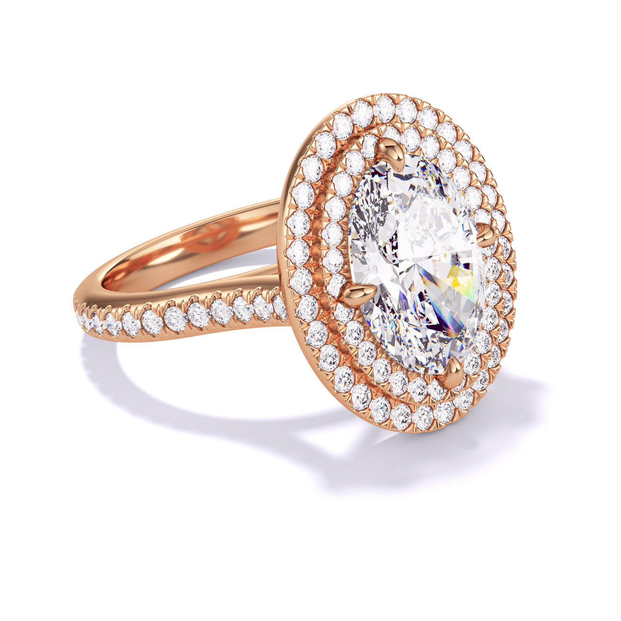 OVAL CUT DIAMOND ENGAGEMENT RING WITH A DOUBLE HALO THREE PHASES PAVE SETTING IN 18K ROSE GOLD