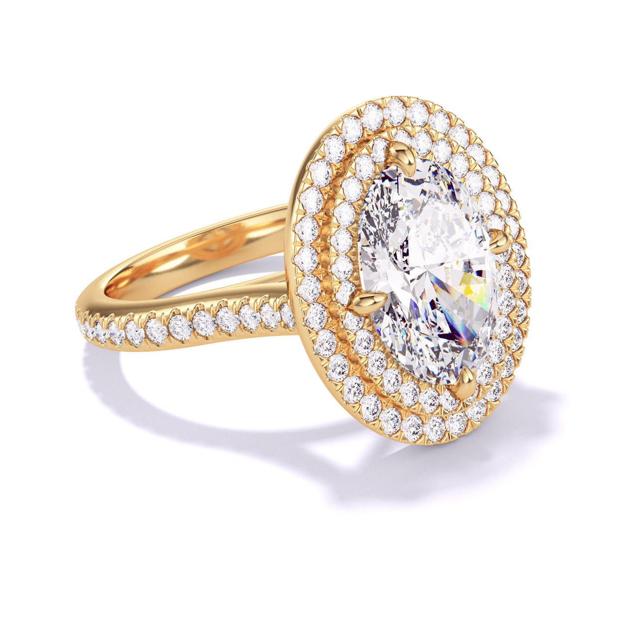 OVAL CUT DIAMOND ENGAGEMENT RING WITH A DOUBLE HALO THREE PHASES PAVE SETTING IN 18K YELLOW GOLD