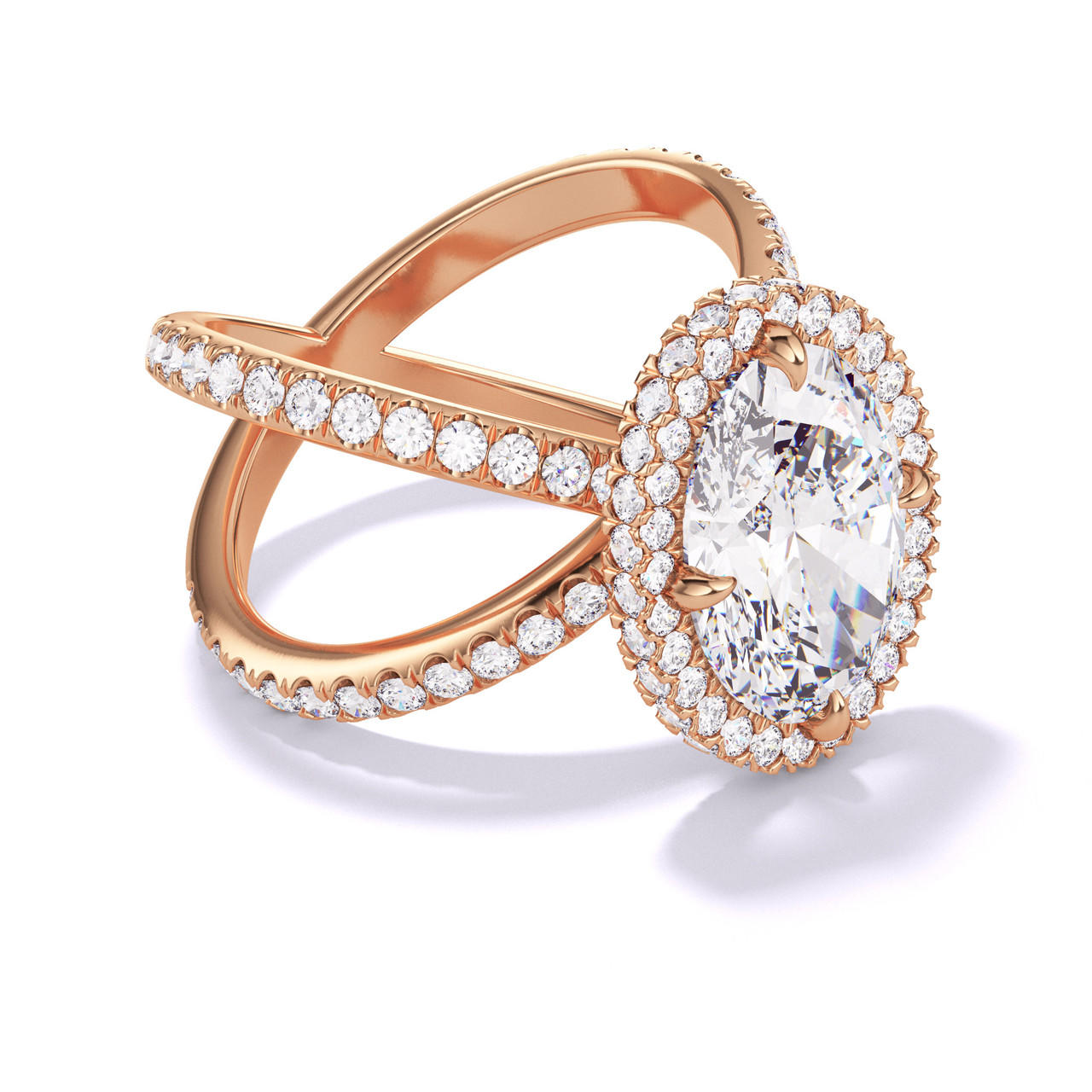 OVAL CUT DIAMOND ENGAGEMENT RING WITH A WRAPPED HALO AXIS PAVE SETTING IN 18K ROSE GOLD