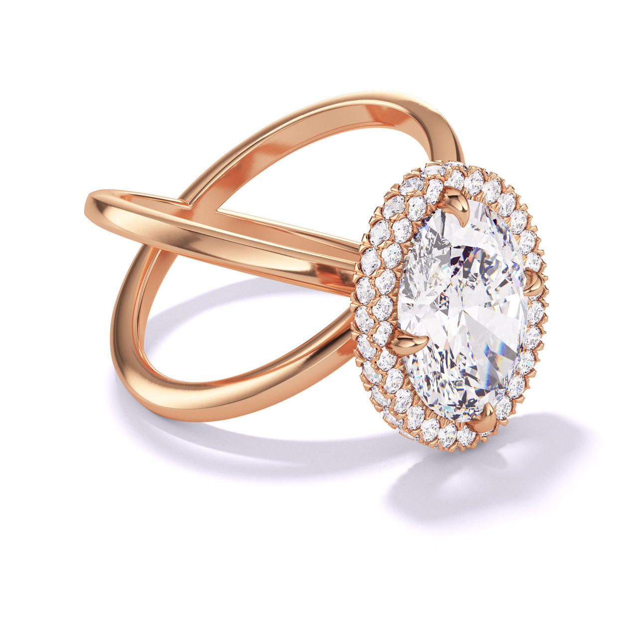 OVAL CUT DIAMOND ENGAGEMENT RING WITH A WRAPPED HALO AXIS SETTING IN 18K ROSE GOLD