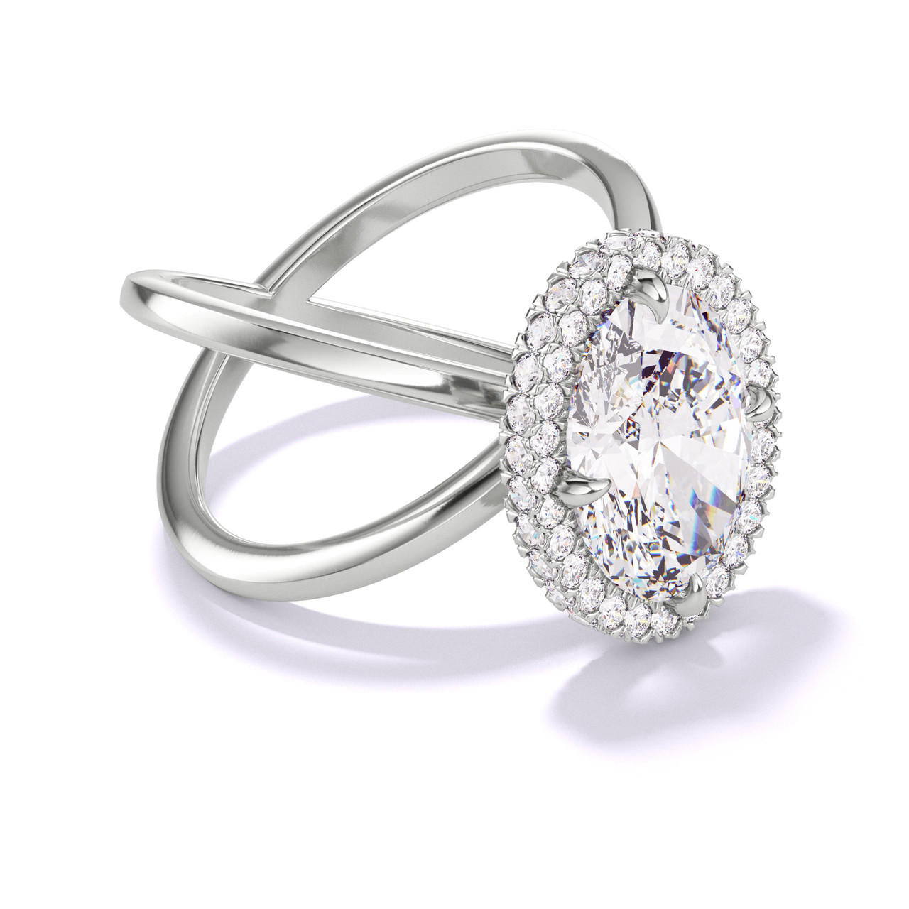 OVAL CUT DIAMOND ENGAGEMENT RING WITH A WRAPPED HALO AXIS SETTING IN PLATINUM