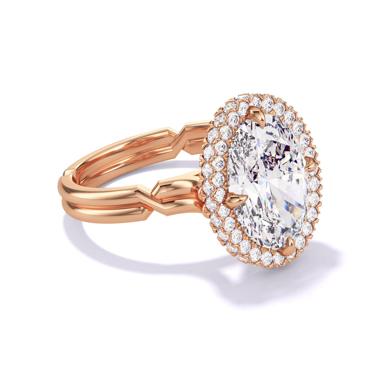 OVAL CUT DIAMOND ENGAGEMENT RING WITH A WRAPPED HALO CHANCE SETTING IN 18K ROSE GOLD