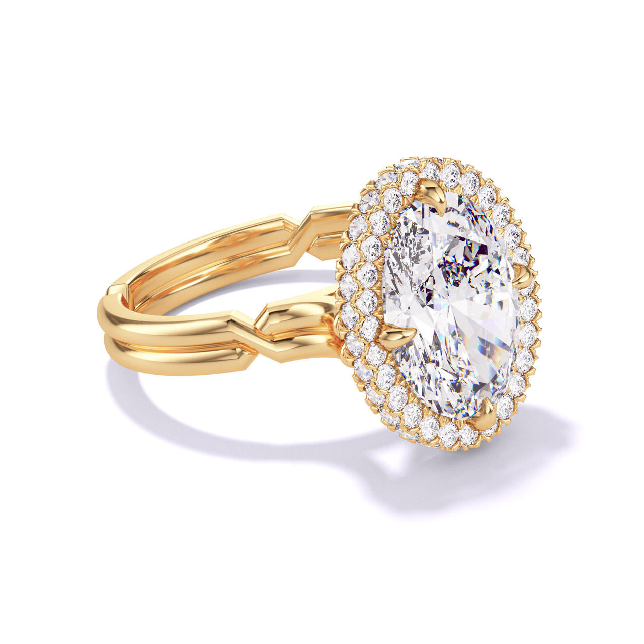 OVAL CUT DIAMOND ENGAGEMENT RING WITH A WRAPPED HALO CHANCE SETTING IN 18K YELLOW GOLD