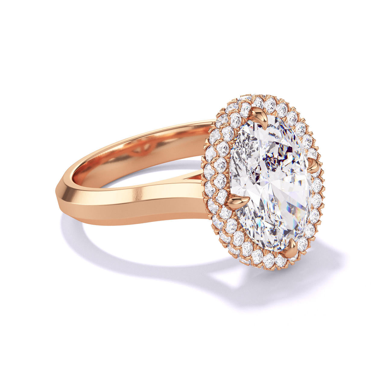 OVAL CUT DIAMOND ENGAGEMENT RING WITH A WRAPPED HALO THREE PHASES SETTING IN 18K ROSE GOLD