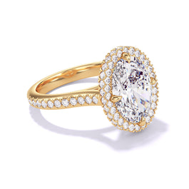 Angled view of the Oval Cut Diamond Engagement Ring with a Wrapped Halo Three Phases Pavé Setting in 18K yellow gold.