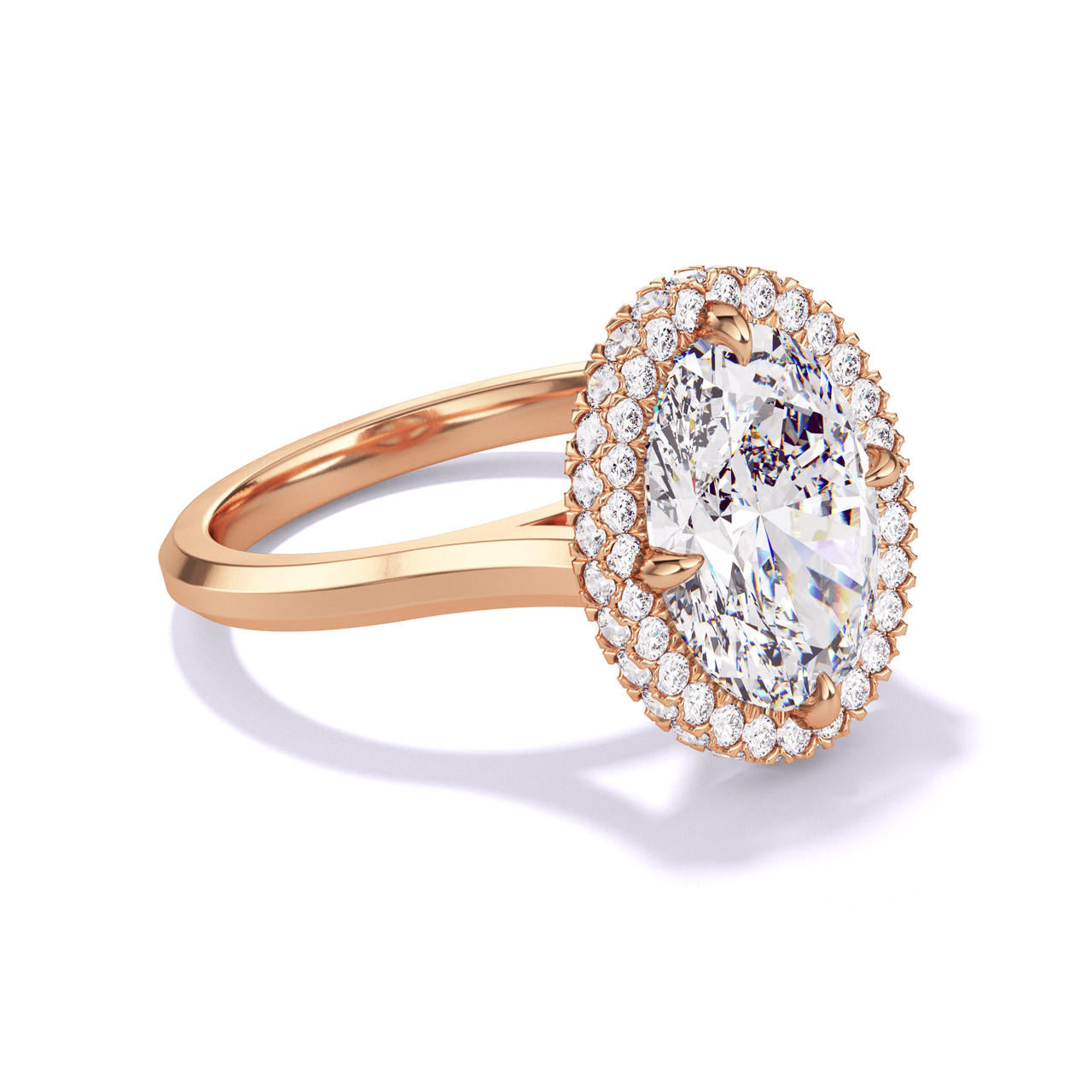 OVAL CUT DIAMOND ENGAGEMENT RING WITH A WRAPPED HALO THREE PHASES SLIM SETTING IN 18K ROSE GOLD