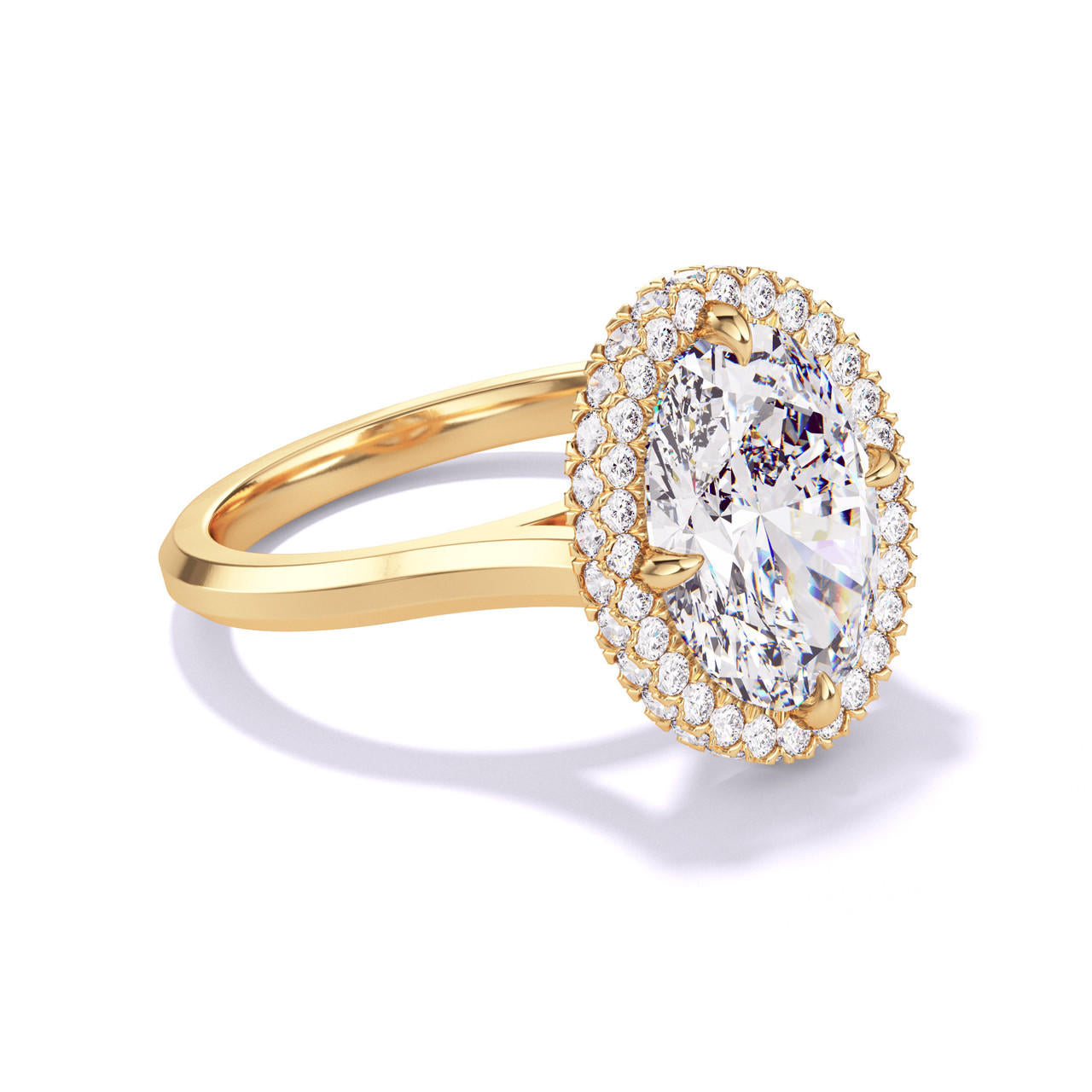 OVAL CUT DIAMOND ENGAGEMENT RING WITH A WRAPPED HALO THREE PHASES SLIM SETTING IN 18K YELLOW GOLD