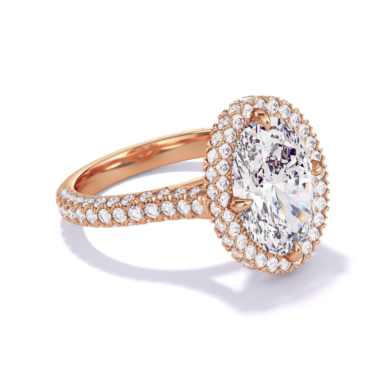 OVAL CUT DIAMOND ENGAGEMENT RING WITH A WRAPPED HALO THREE PHASES TRIPLE PAVE SETTING IN 18K ROSE GOLD