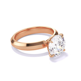 ROUND CUT DIAMOND ENGAGEMENT RING WITH A CLASSIC 4 PRONG THREE PHASES SETTING IN 18K ROSE GOLD