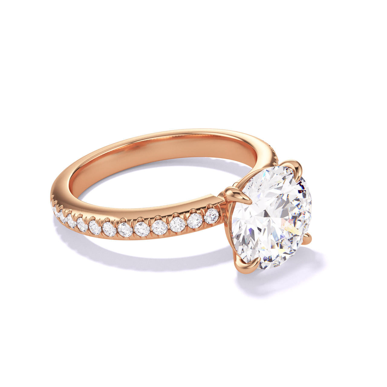 ROUND CUT DIAMOND ENGAGEMENT RING WITH A CLASSIC 4 PRONG THREE PHASES PAVE SETTING IN 18K ROSE GOLD