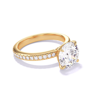 ROUND CUT DIAMOND ENGAGEMENT RING WITH A CLASSIC 4 PRONG THREE PHASES PAVE SETTING IN 18K YELLOW GOLD