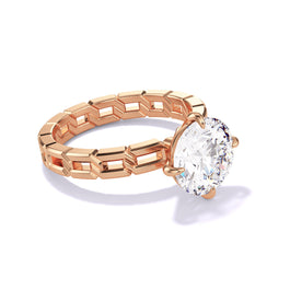 Lindsey Scoggins Studio’s Round Cut Diamond Engagement Ring in 18K Rose Gold, featuring a 16 links compass 4 prong setting.