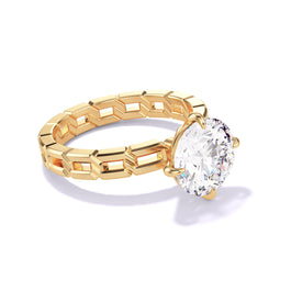 Lindsey Scoggins Studio’s 18K Yellow Gold Round Cut Diamond Engagement Ring with a Compass 4 Prong 16 Links Setting.