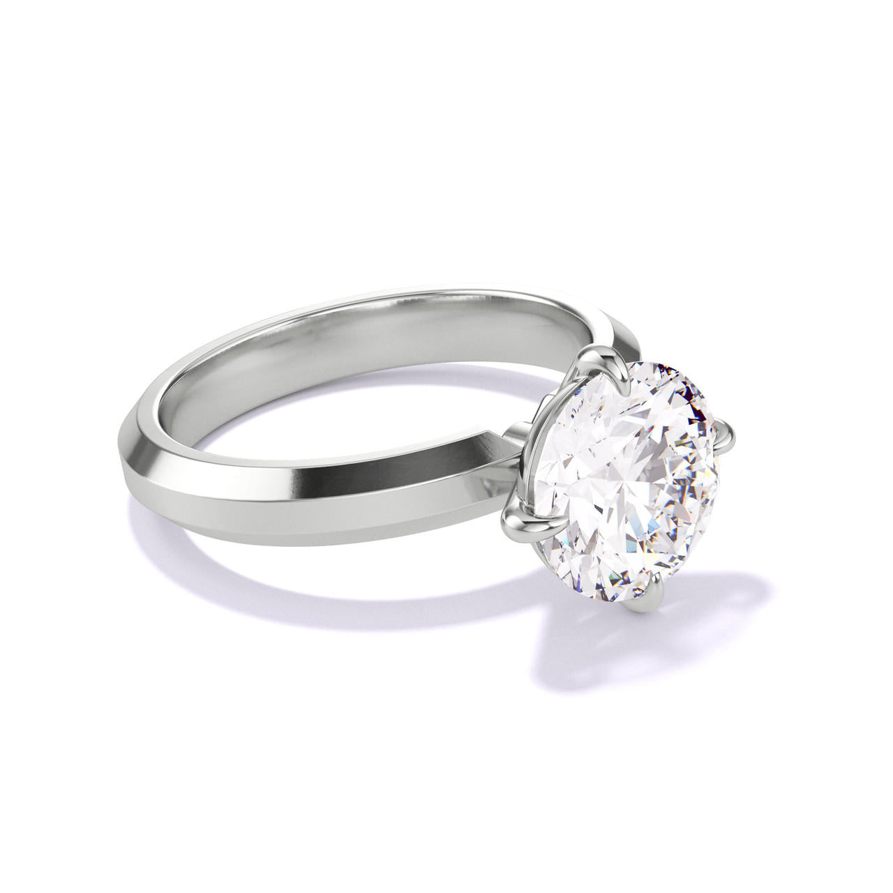 Platinum Round Engagement Ring with a Compass 4 Prong Three Phases Setting 