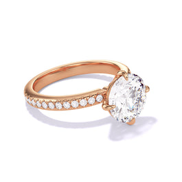 ROUND CUT DIAMOND ENGAGEMENT RING WITH A COMPASS 4 PRONG THREE PHASES PAVE SETTING IN 18K ROSE GOLD