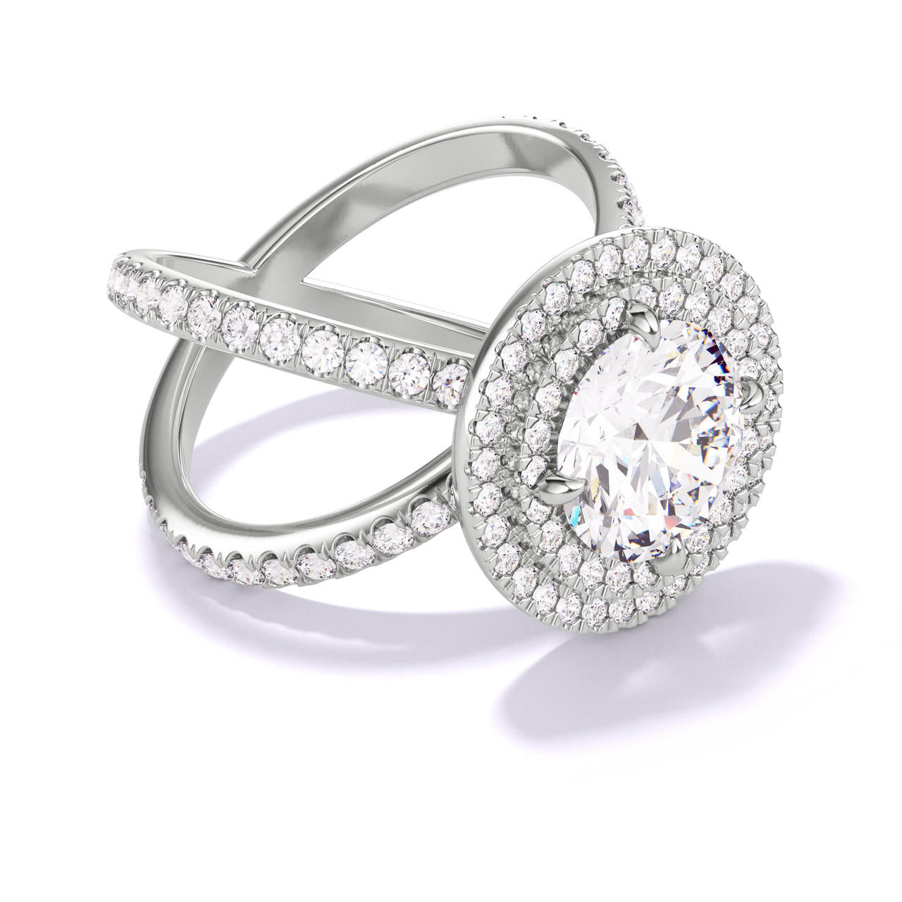 ROUND CUT DIAMOND ENGAGEMENT RING WITH A DOUBLE HALO AXIS PAVE SETTING IN PLATINUM