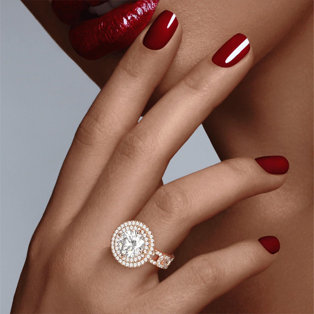 ROUND CUT DIAMOND ENGAGEMENT RING WITH A DOUBLE HALO 16 PAVE LINKS SETTING IN 18K ROSE GOLD