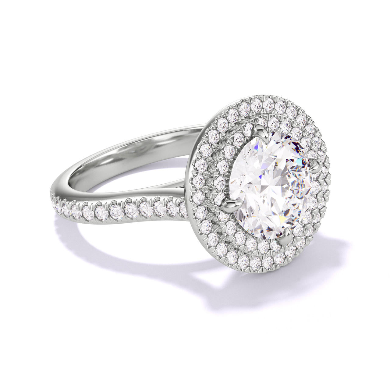 ROUND CUT DIAMOND ENGAGEMENT RING WITH A DOUBLE HALO THREE PHASES PAVE SETTING IN PLATINUM