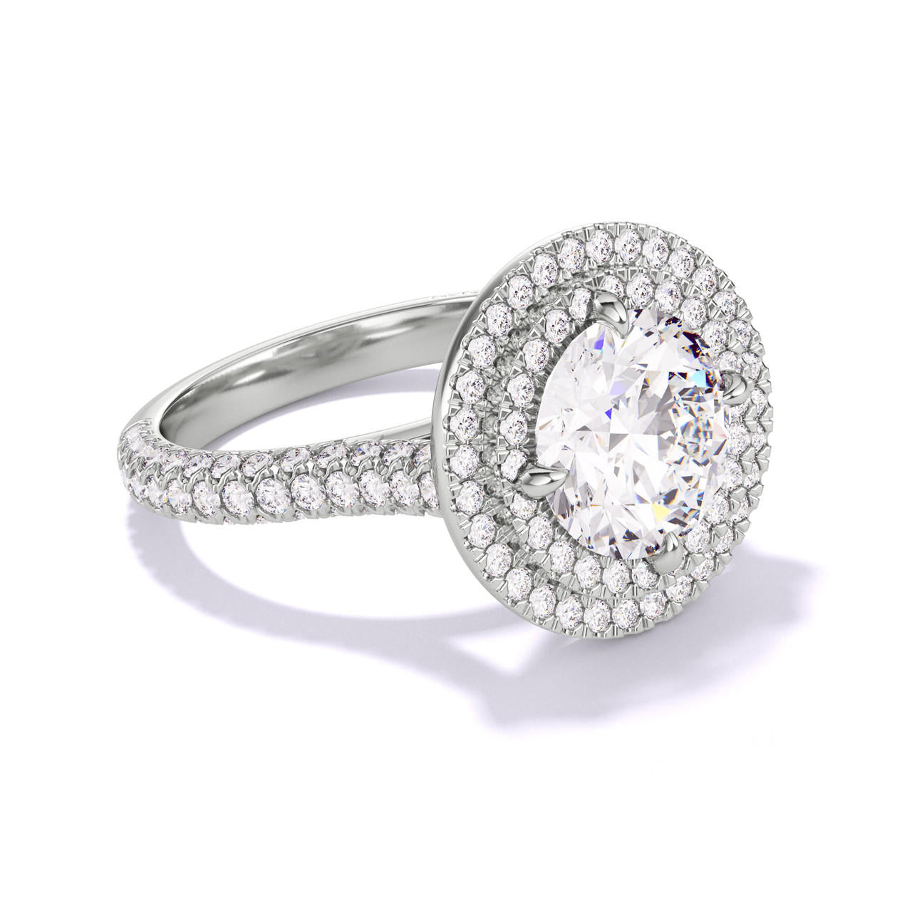 ROUND CUT DIAMOND ENGAGEMENT RING WITH A DOUBLE HALO THREE PHASES TRIPLE PAVE SETTING IN PLATINUM