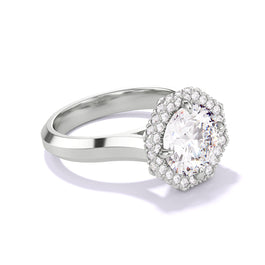 ROUND CUT DIAMOND ENGAGEMENT RING WITH AN OCTAGON HALO THREE PHASES SETTING IN PLATINUM