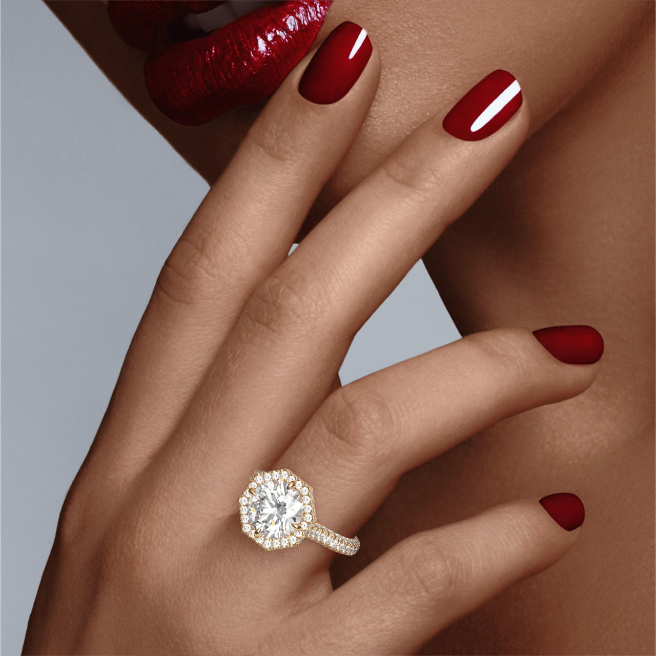 ROUND CUT DIAMOND ENGAGEMENT RING WITH AN OCTAGON HALO THREE PHASES TRIPLE PAVE SETTING IN 18K YELLOW GOLD