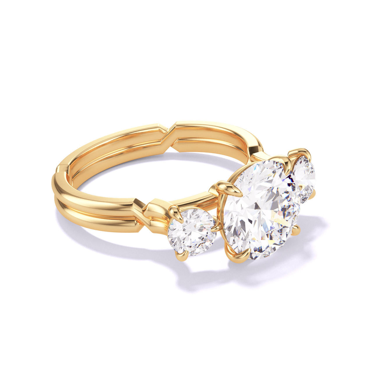 ROUND CUT DIAMOND ENGAGEMENT RING WITH A THREE STONE CHANCE SETTING IN 18K YELLOW GOLD