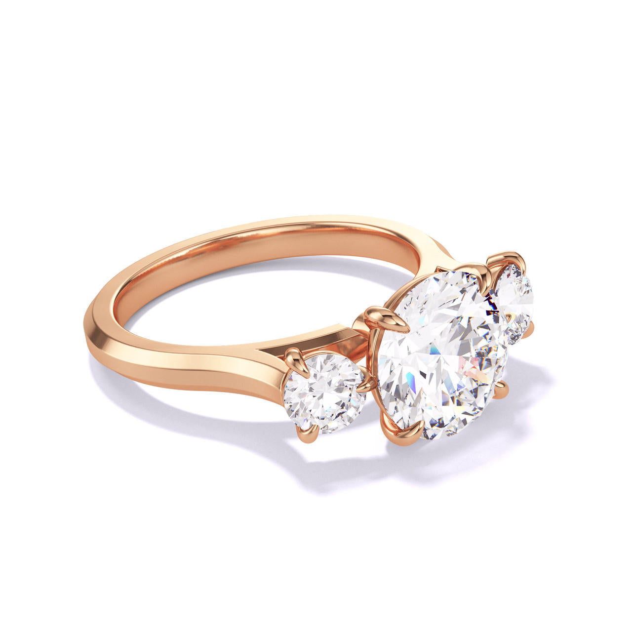 ROUND CUT DIAMOND ENGAGEMENT RING WITH A THREE STONE THREE PHASES SLIM SETTING IN 18K ROSE GOLD