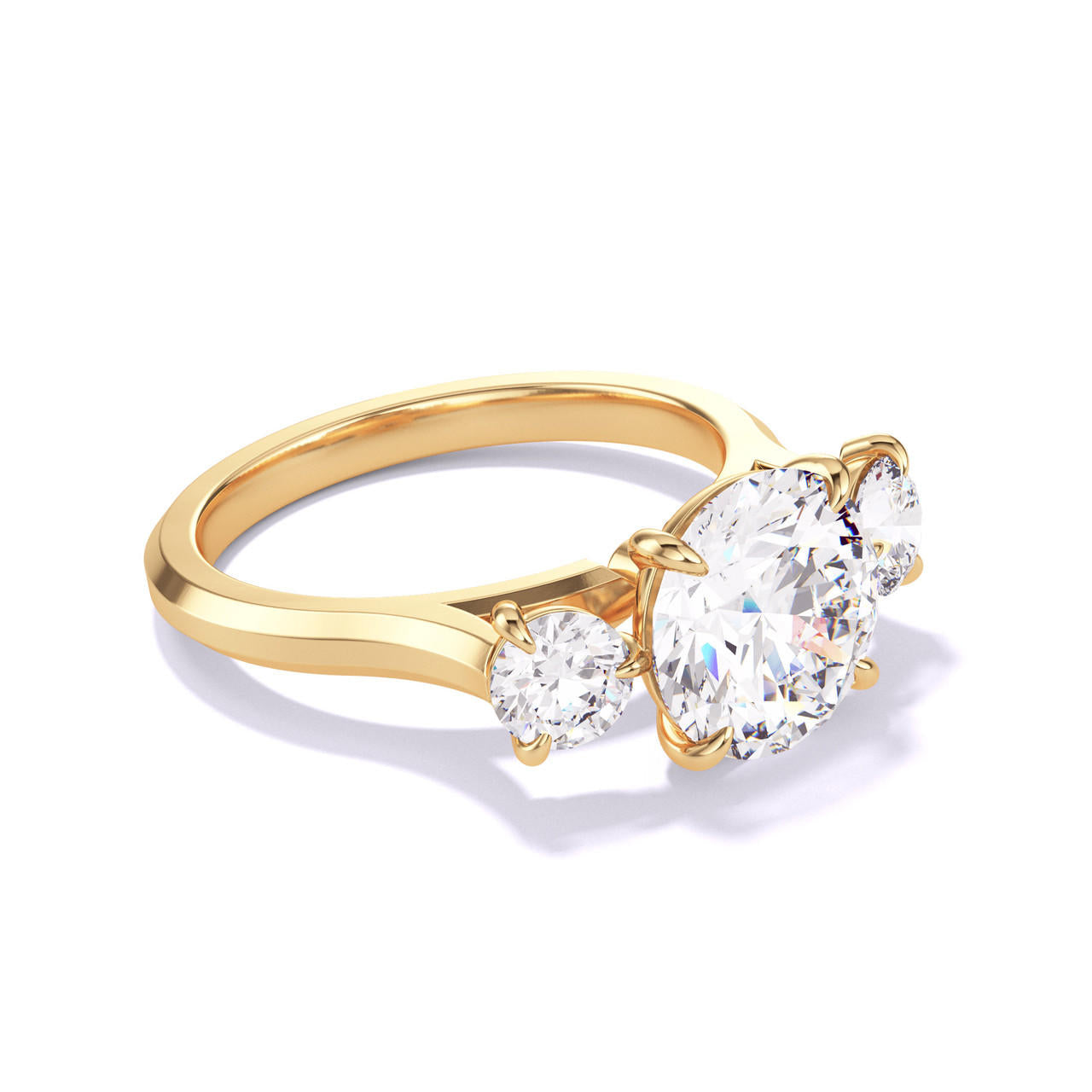 ROUND CUT DIAMOND ENGAGEMENT RING WITH A THREE STONE THREE PHASES SLIM SETTING IN 18K YELLOW GOLD