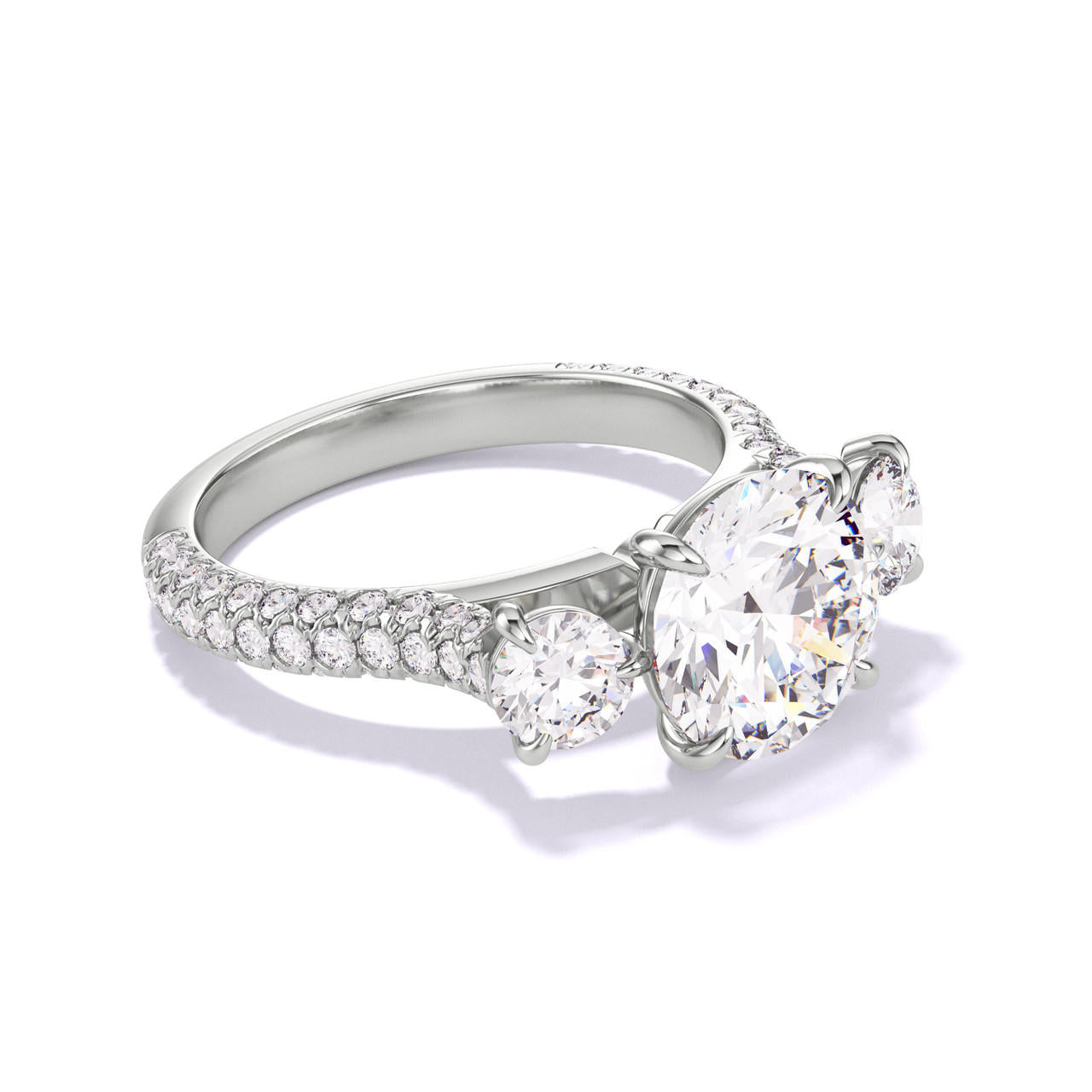 ROUND CUT DIAMOND ENGAGEMENT RING WITH A THREE STONE THREE PHASES TRIPLE PAVE SETTING IN PLATINUM