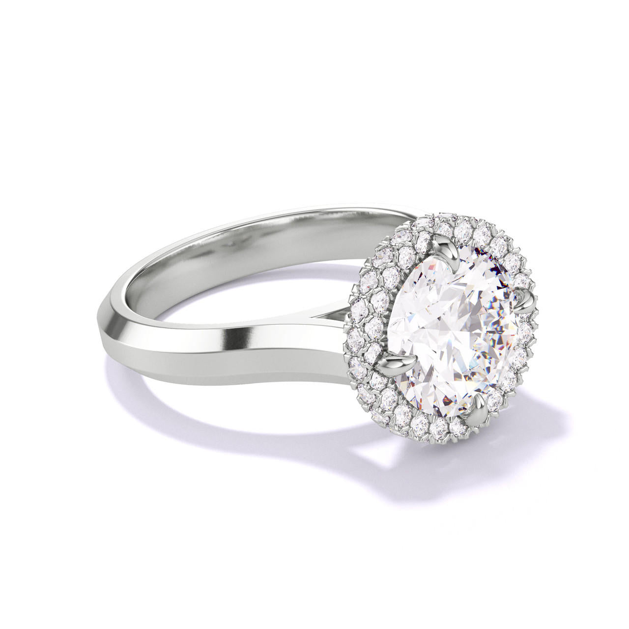 ROUND CUT DIAMOND ENGAGEMENT RING WITH A WRAPPED HALO THREE PHASES SETTING IN PLATINUM