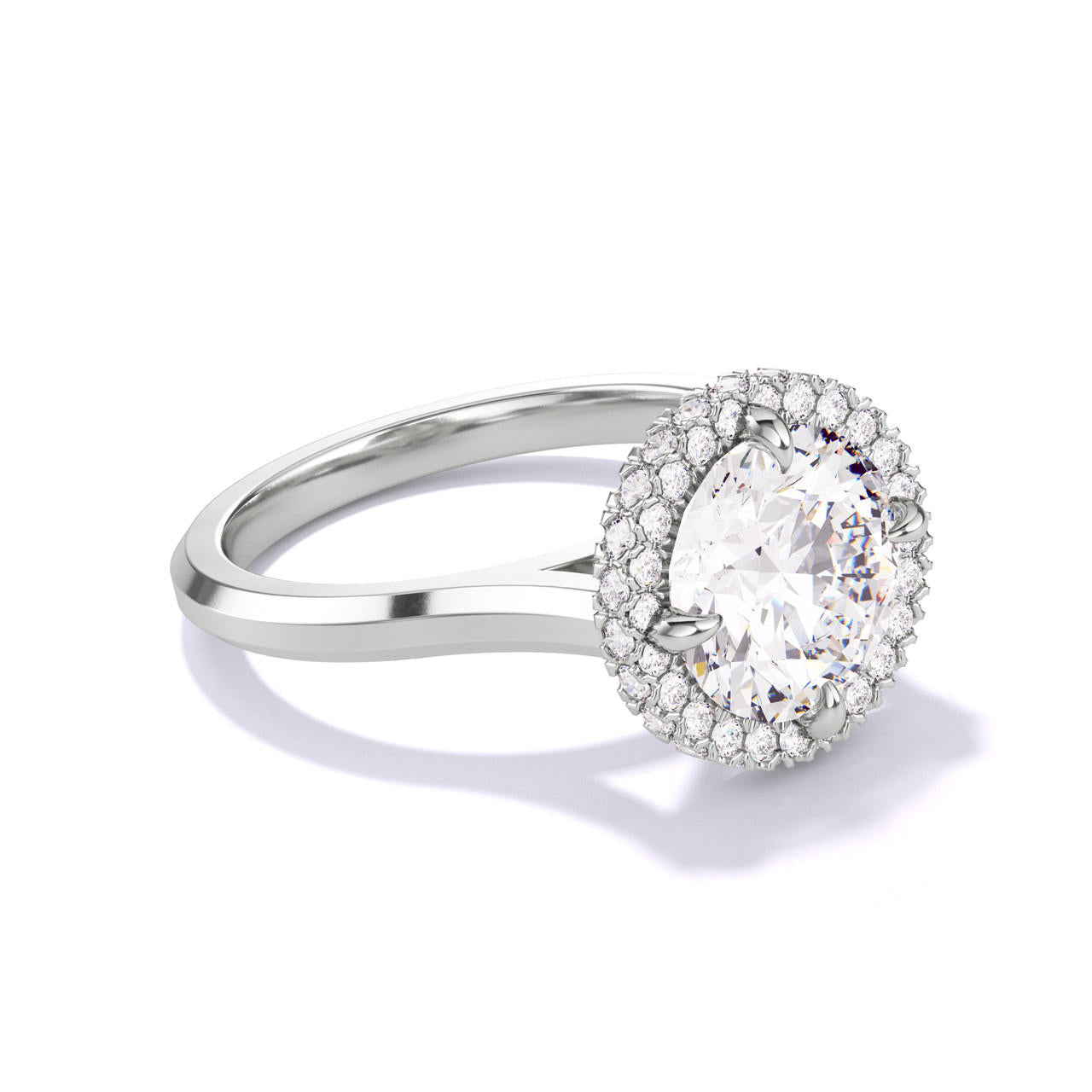 ROUND CUT DIAMOND ENGAGEMENT RING WITH A WRAPPED HALO THREE PHASES SLIM SETTING IN PLATINUM