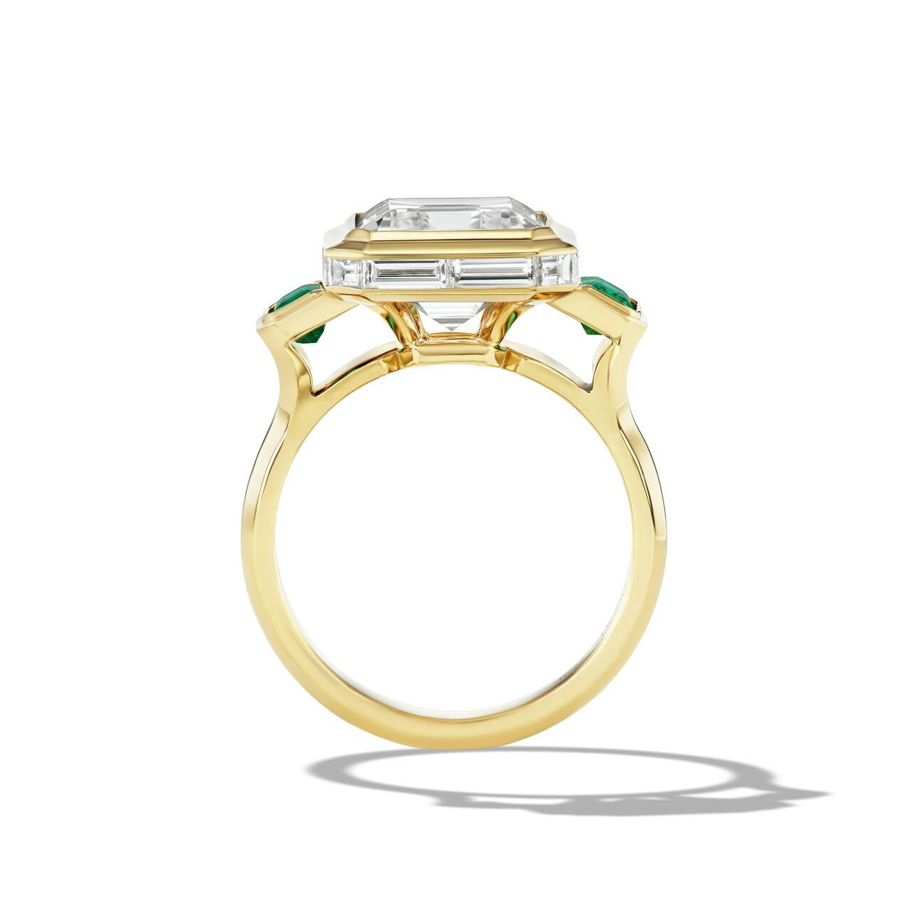 Emerald-and-diamond-three-stone-ring