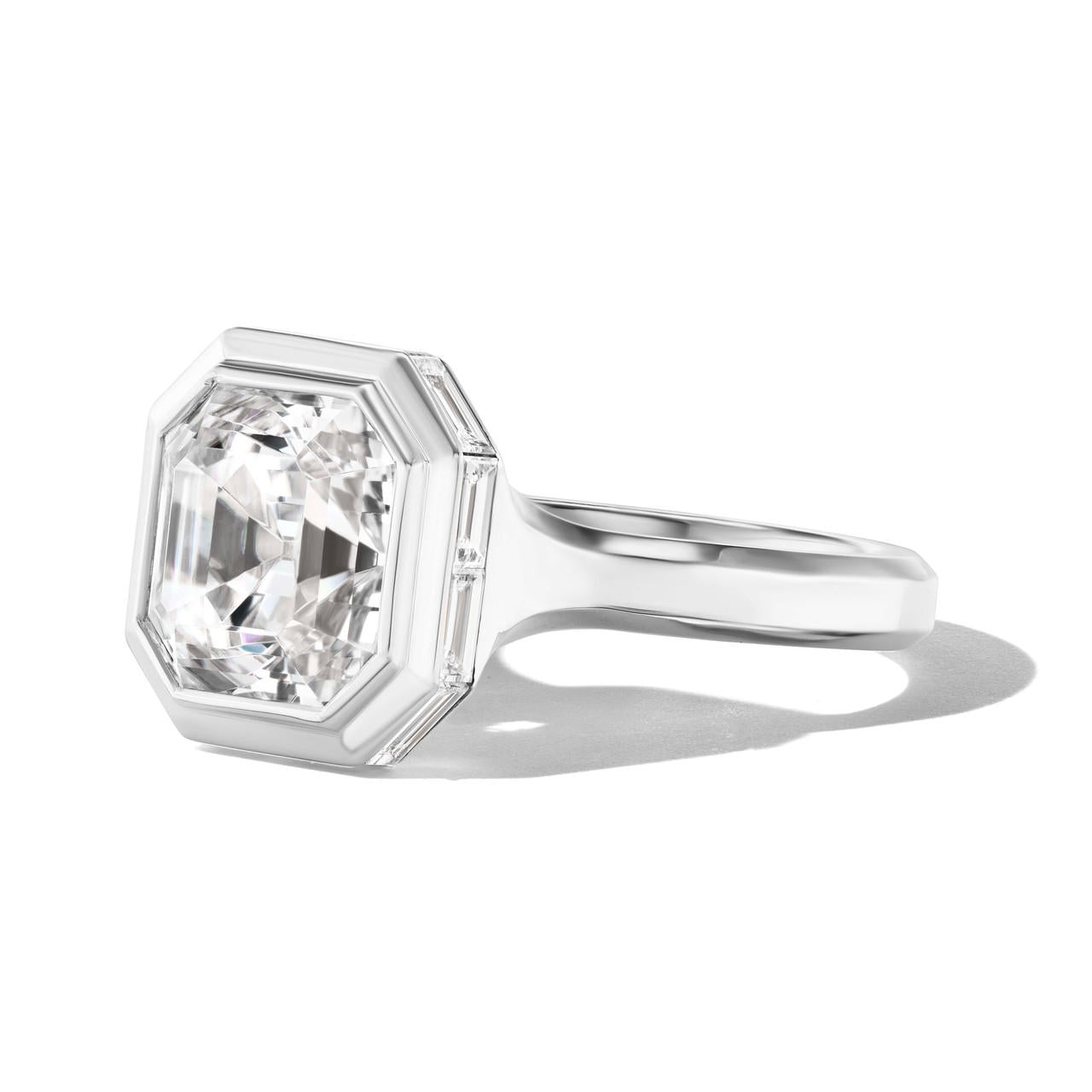 SHIELD BEZEL SET ASSCHER CUT DIAMOND ENGAGEMENT RING IN PLATINUM