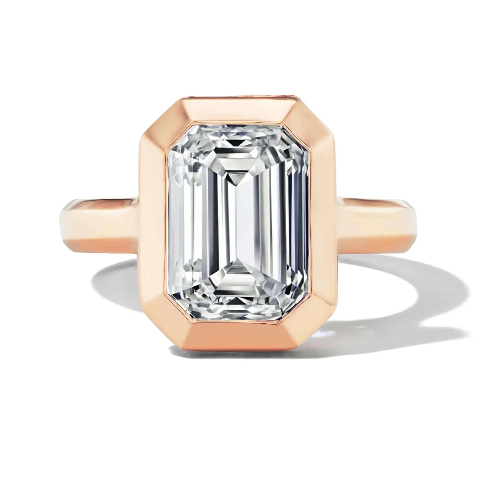 east-west-emerald-cut-bezel-set-ring